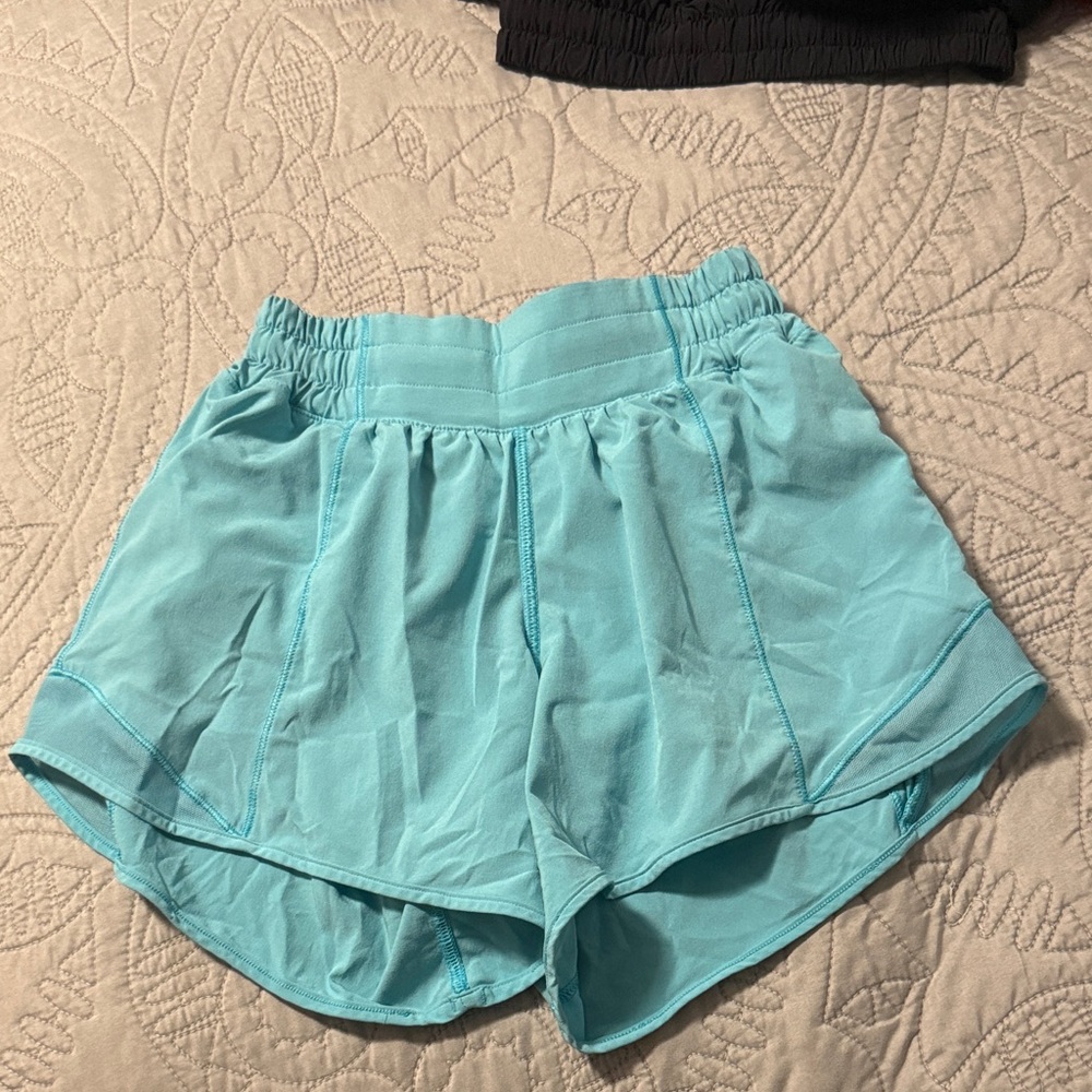 Electric turquoise lululemon hotty hot shorts